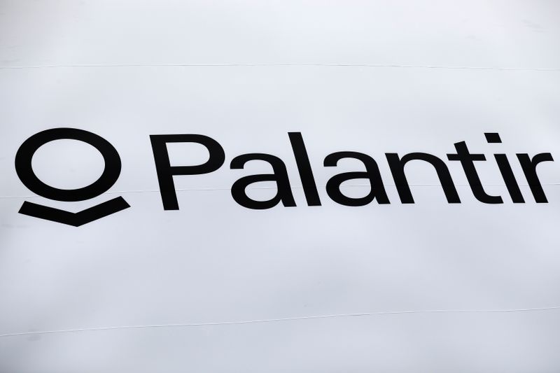 FILE PHOTO: A banner featuring the logo of Palantir Technologies