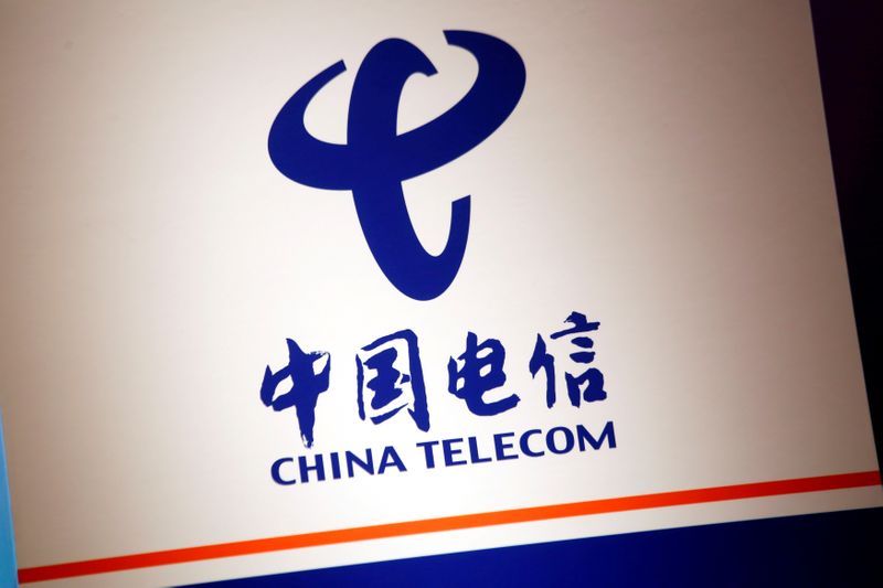 FILE PHOTO: The company logo of China Telecom is displayed