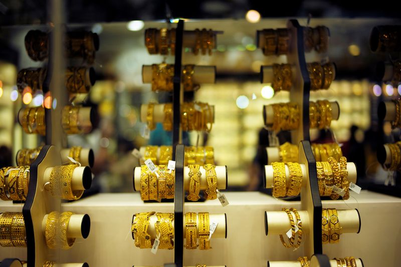 FILE PHOTO: Gold bangles are displayed at a gold shop