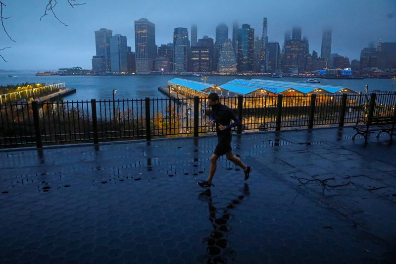 FILE PHOTO: A man runs along the Brooklyn Heights Promenade