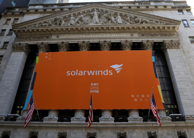 FILE PHOTO: SolarWinds Corp. banner hangs on the company’s IPO