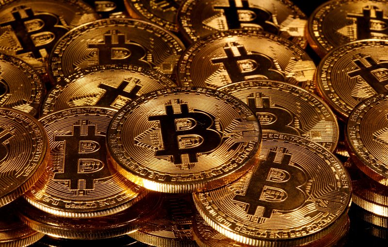 FILE PHOTO: Representations of virtual currency Bitcoin are seen in