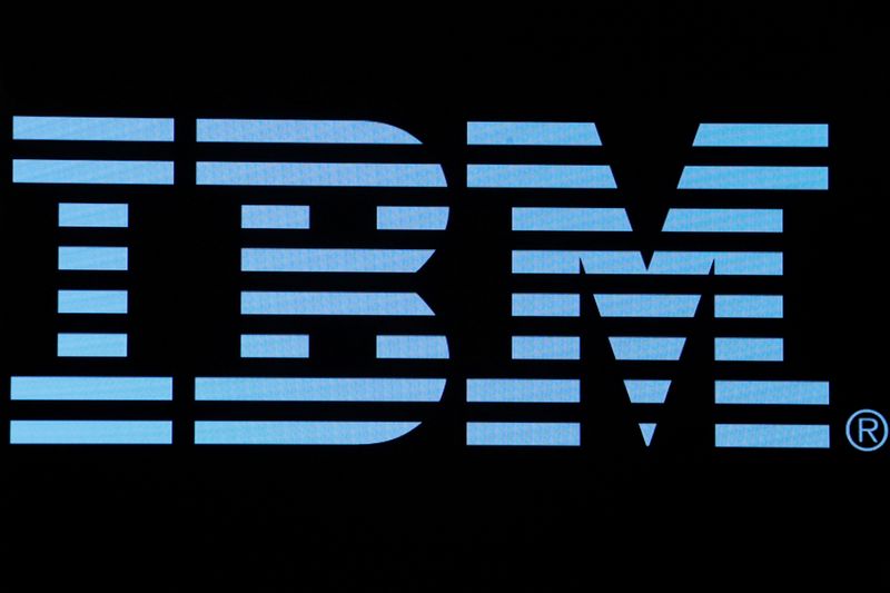 The logo for IBM is displayed on a screen on
