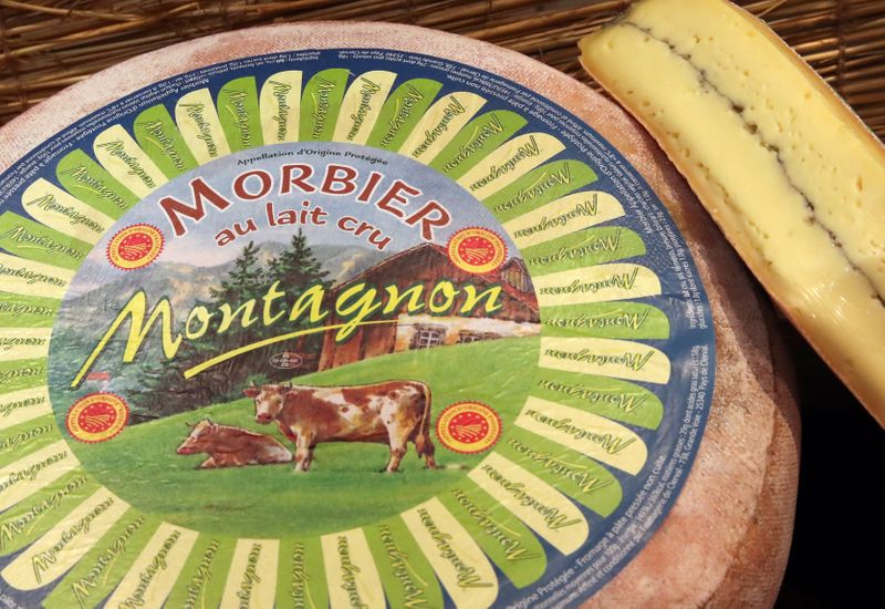 A wheel of Morbier cheese is seen in a shop