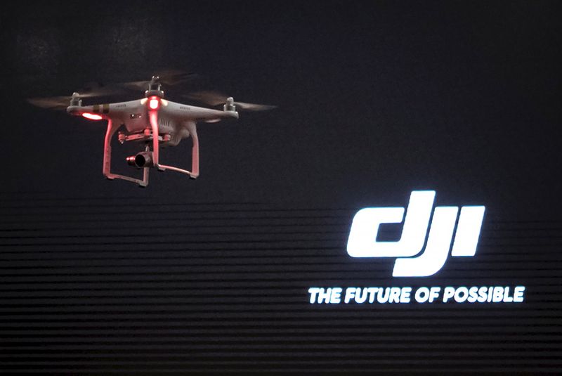 The DJI Phantom 3, a consumer drone, takes flight after