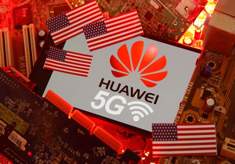 The U.S. flag and a smartphone with the Huawei and