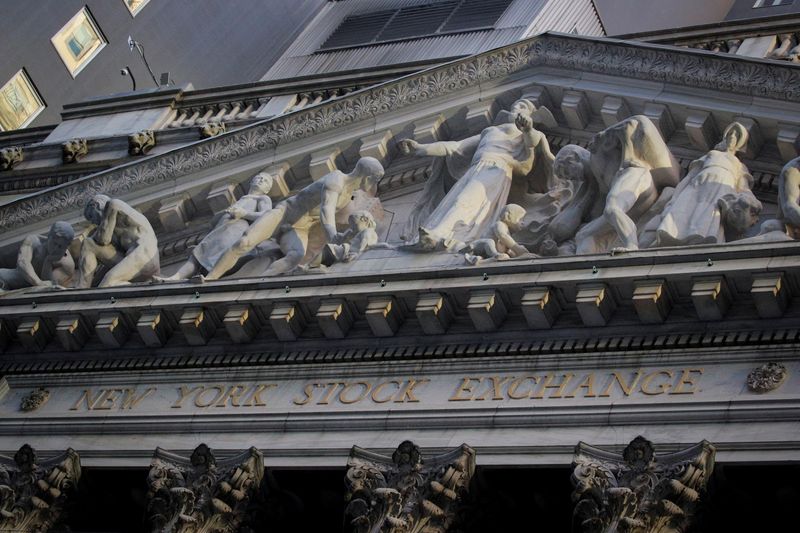 The front facade of the NYSE is ssen in New
