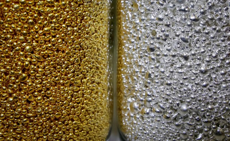 FILE PHOTO: Granules of 99.99 percent pure gold and silver