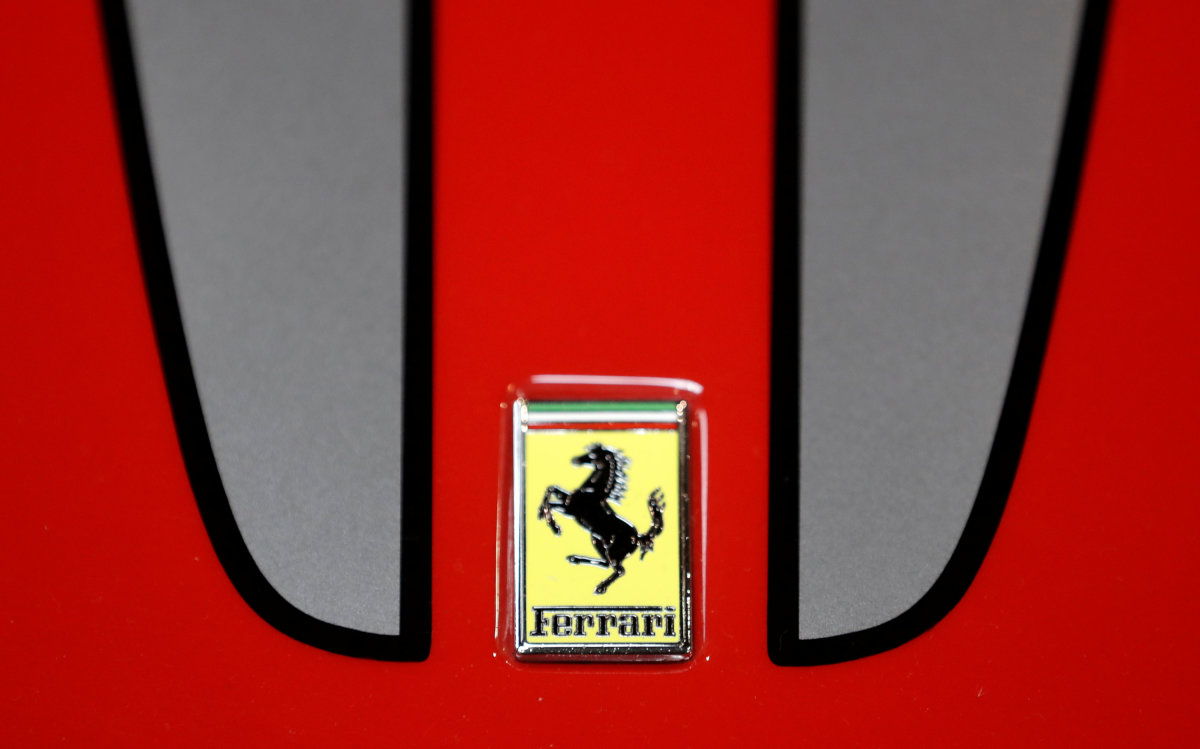 The logo of Ferrari is seen on a car during