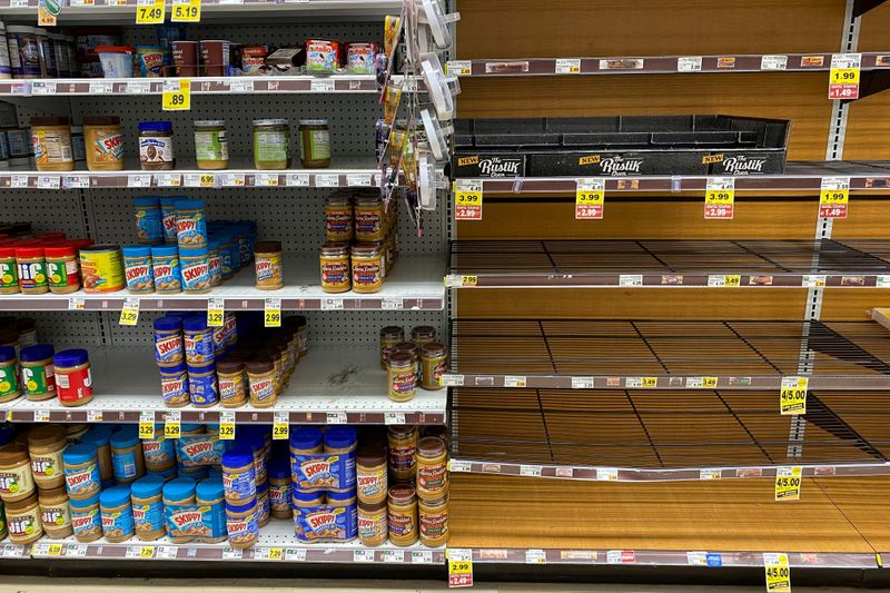 FILE PHOTO: Grocery store shelves are seen inside Kroger Co.’s
