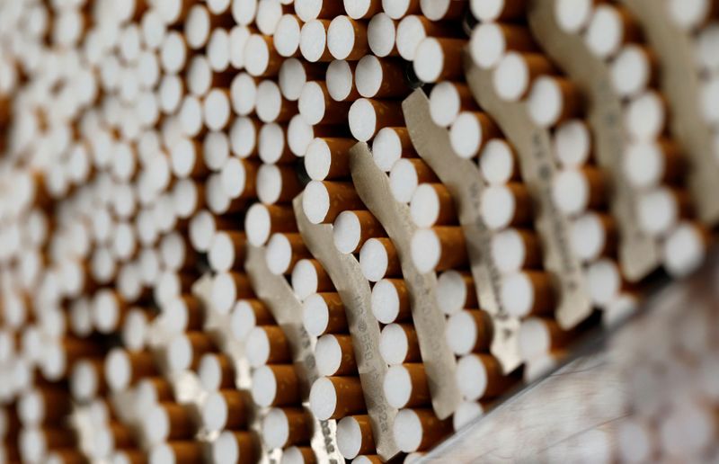 Cigarettes are seen during manufacturing process in BAT Cigarette Factory