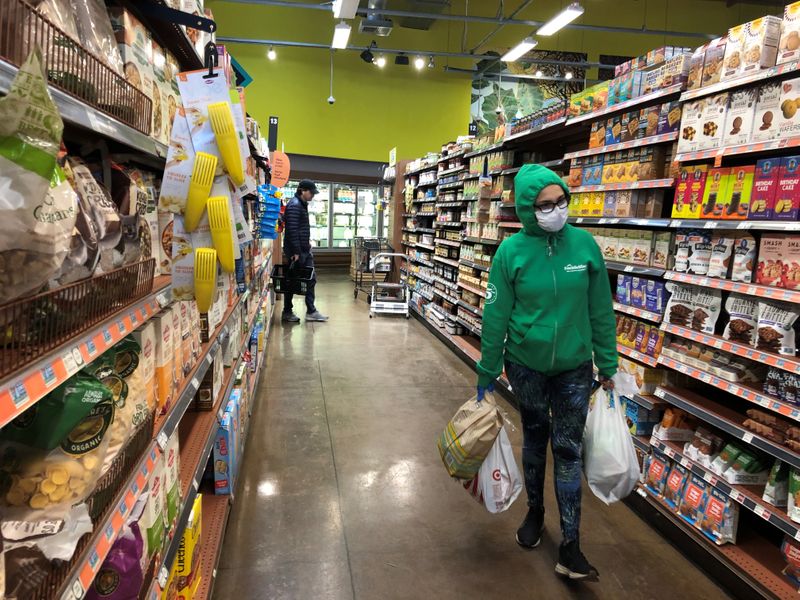 Shoppers are seen at Whole Foods in Los Angeles, California