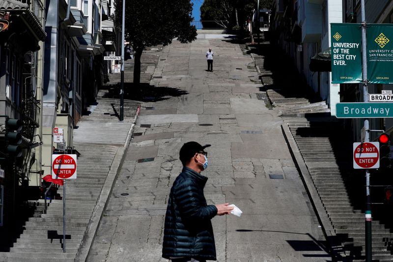 FILE PHOTO: People walk on the streets in San Francisco