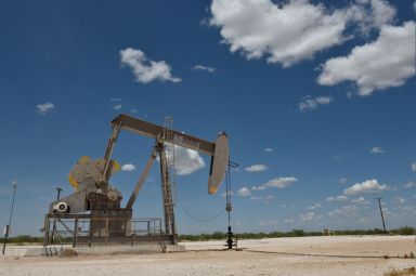 A pump jack operates in the Permian Basin oil production