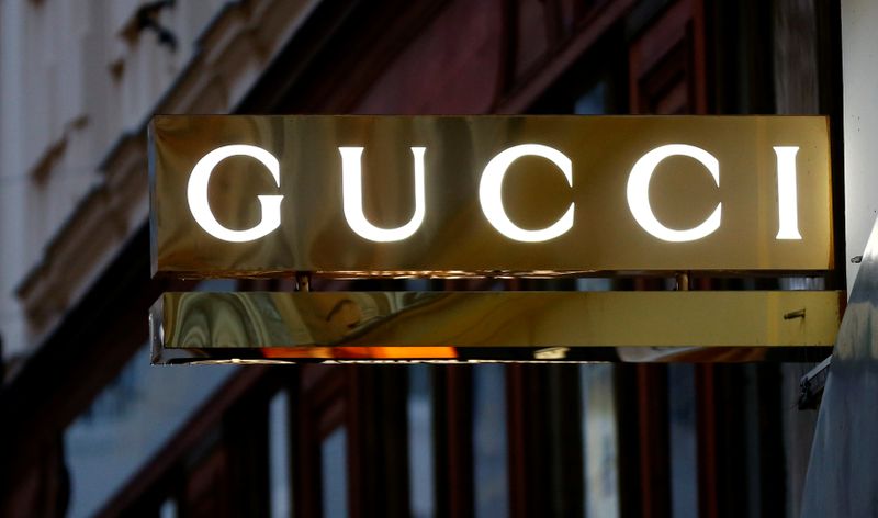 A company logo is pictured outside a Gucci store in