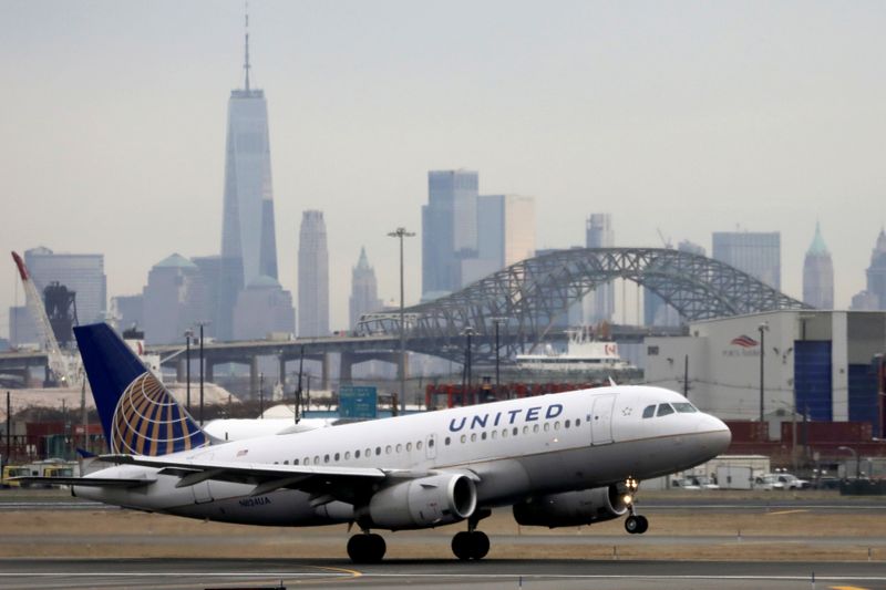 A United Airlines passenger jet takes off with New York