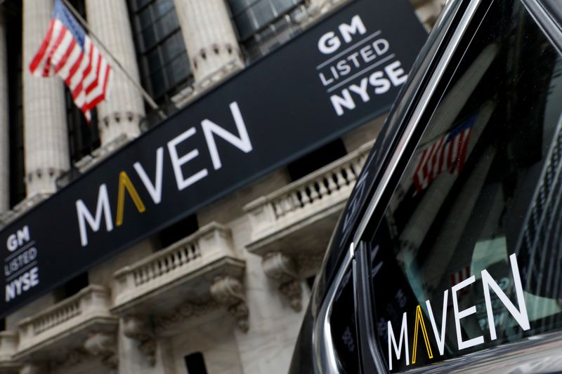 A sign for General Motors Co. car-sharing operation, Maven hangs