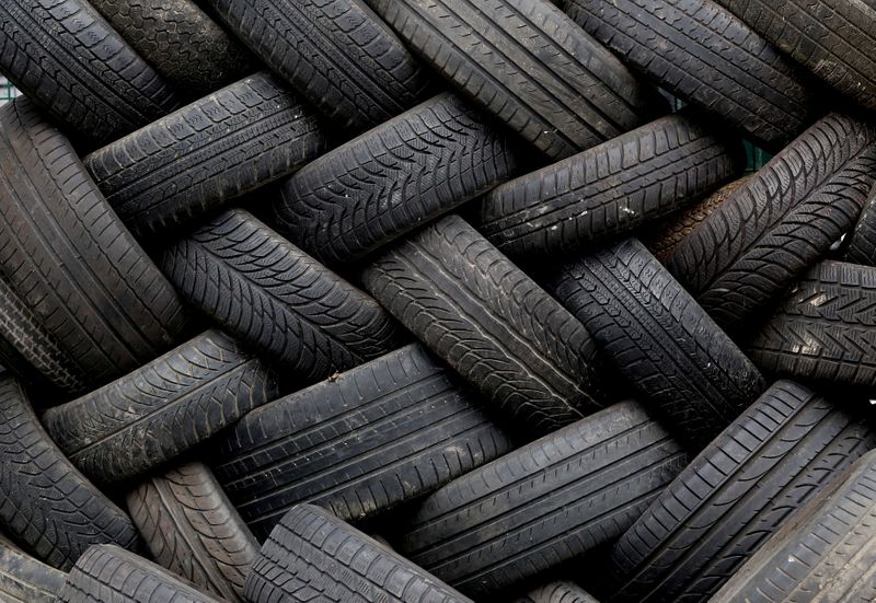 FILE PHOTO: Used tyres are seen in a container at