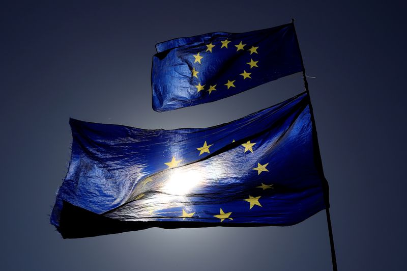 FILE PHOTO: European Union flags flutter as uncertainty over Brexit