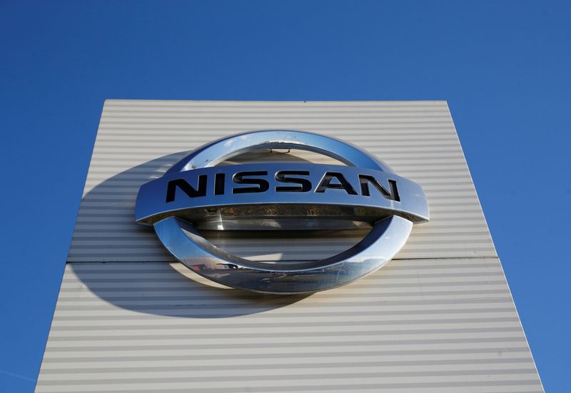 The Nissan logo is seen at Nissan car plant in