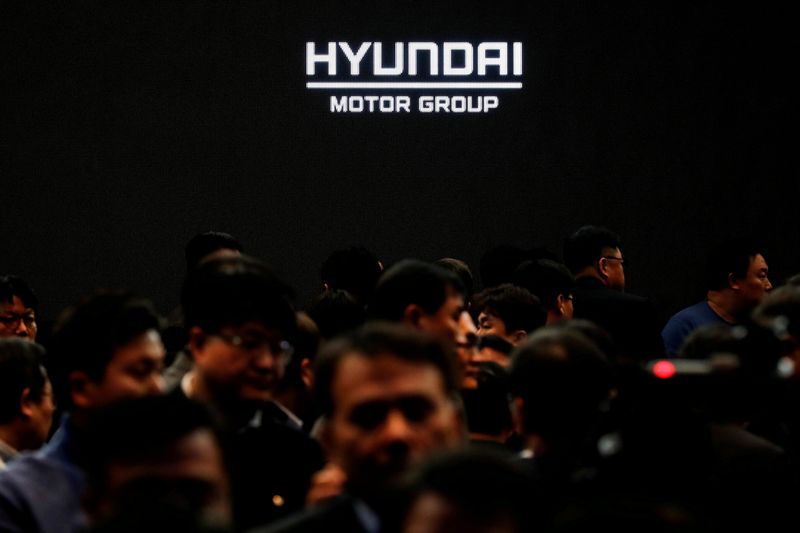 FILE PHOTO: Employees of Hyundai Motor Group leave after the