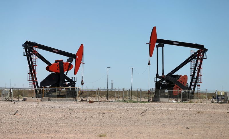 Oil rigs are seen at Vaca Muerta shale oil and