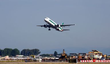 FILE PHOTO: An Alitalia Airbus A321 airplane takes off from