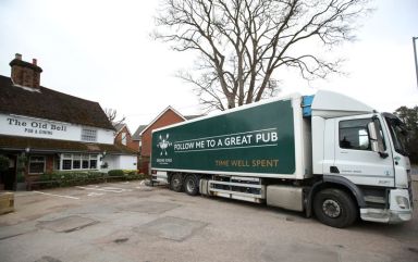 A Green King lorry makes a delivery at The Old