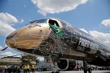 FILE PHOTO: An Embraer E195-2 is seen on display, sporting