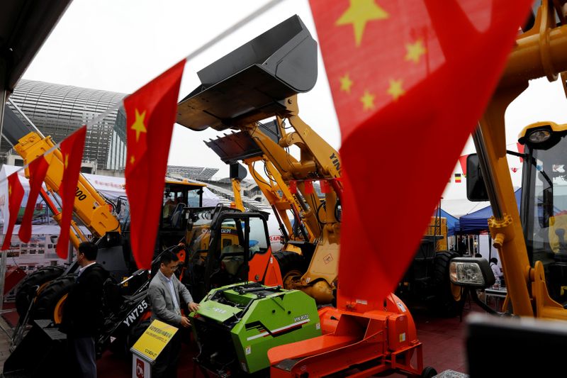 FILE PHOTO: Chinese flags are seen in front of construction