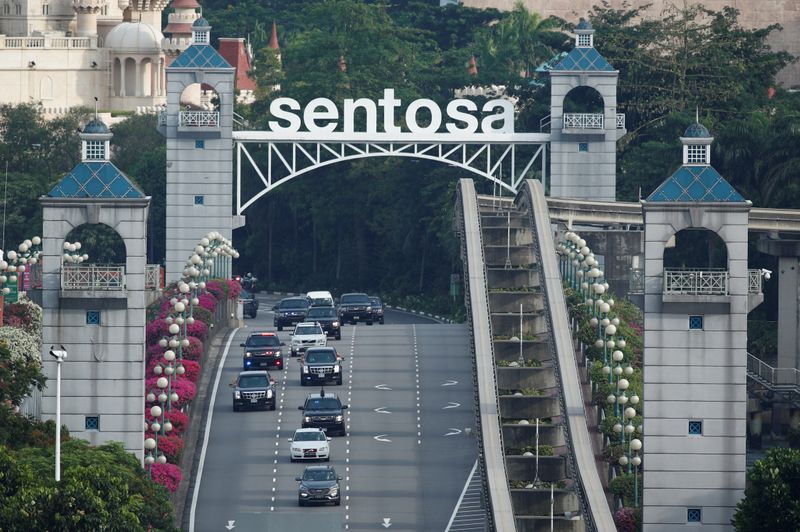 The motorcade of U.S. President Donald Trump leaves Sentosa island,