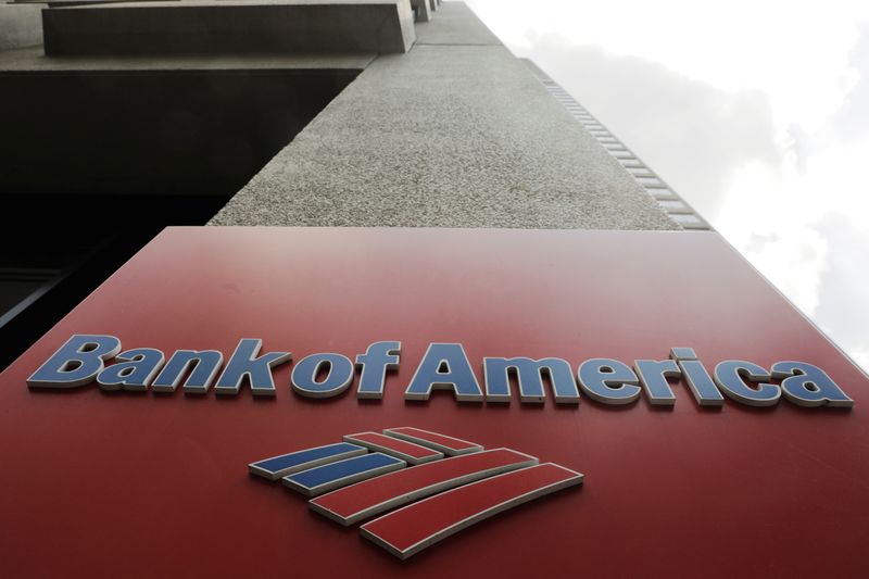 A Bank of America sign stands on the side of