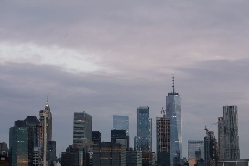 The skyline of lower Manhattan is seen before sunrise in