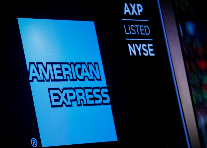 FILE PHOTO: American Express logo and trading symbol are displayed