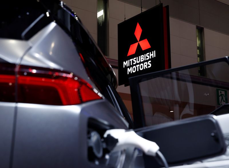 A Mitsubishi Motors signage is pictured next to a Mitsubishi