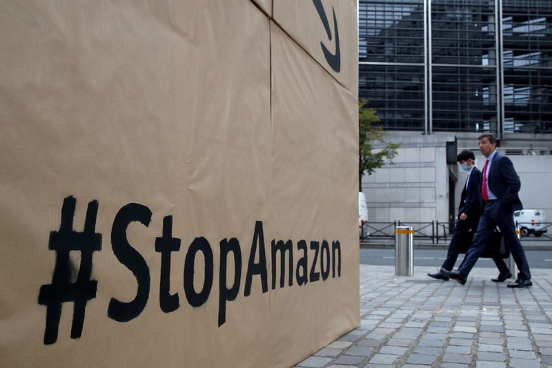 FILE PHOTO: Climate activists attend a demonstration against Amazon near