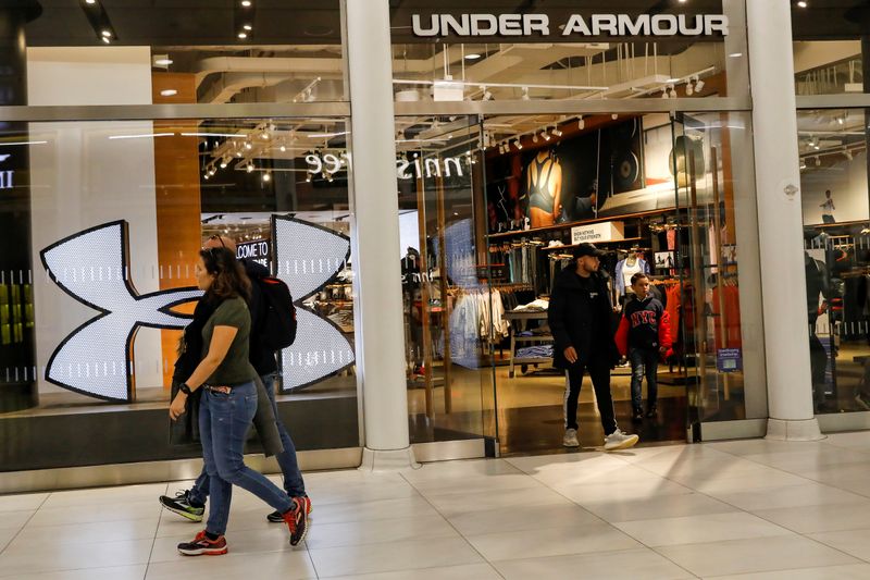 Customers exit an Under Armour store in New York