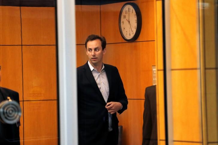 Former Uber engineer Anthony Levandowski leaves the federal court after