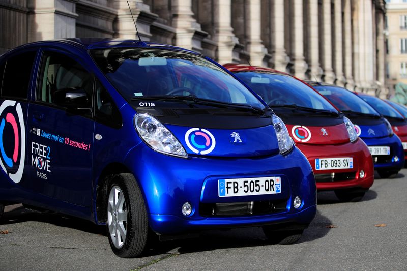 Free2Move Paris electric vehicles by Groupe PSA are displayed outside