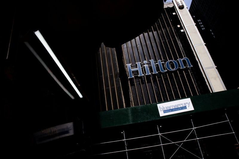 Hilton hotel logo is seen on 52nd street  following