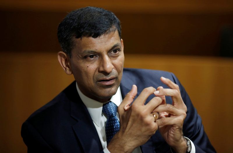 India’s former RBI Governor Rajan, gestures during an interview with