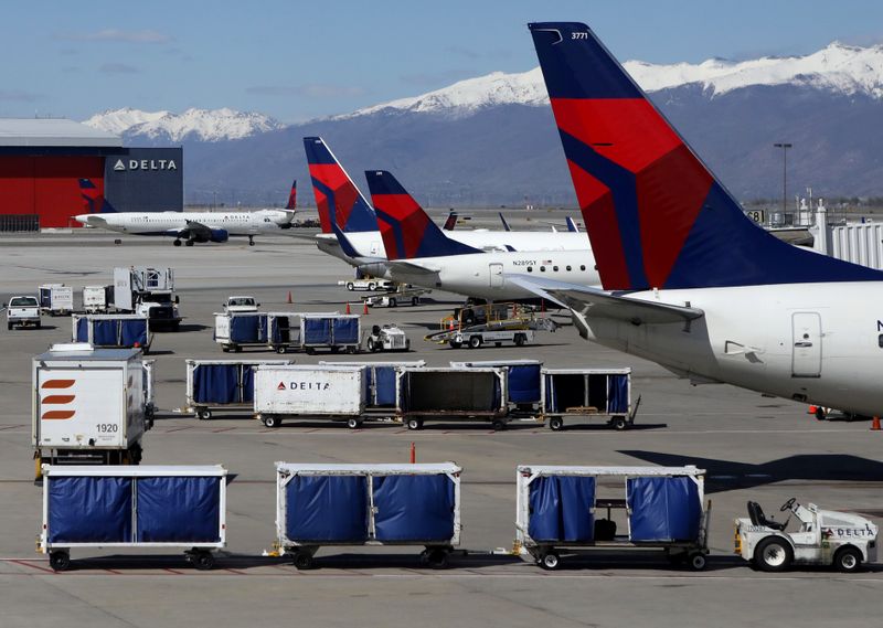 Delta Airlines planes are loaded and unloaded at Salt Lake