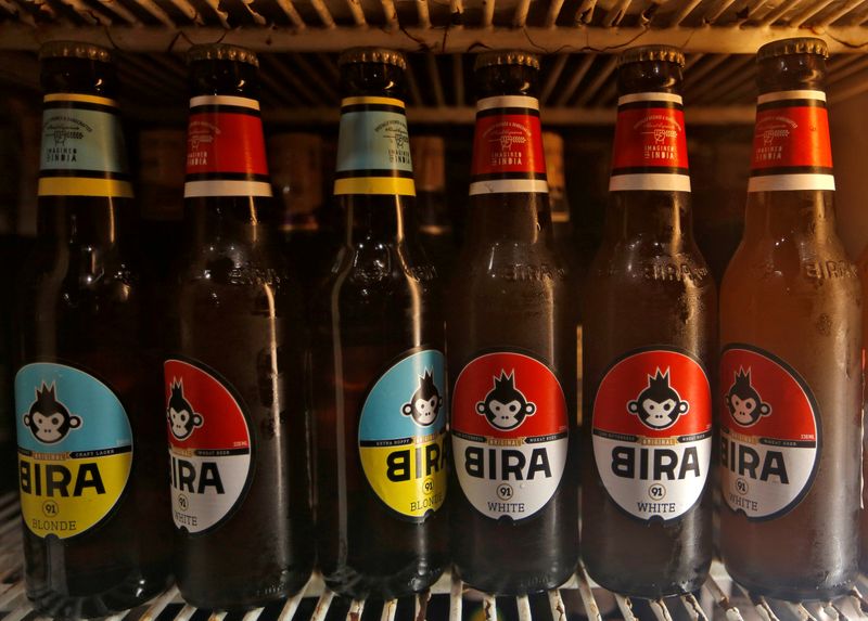 FILE PHOTO: Bira beer bottles are pictured at a liquor