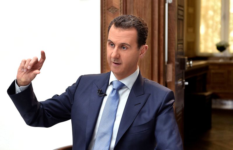 FILE PHOTO: Syria’s President Bashar al-Assad speaks during an interview