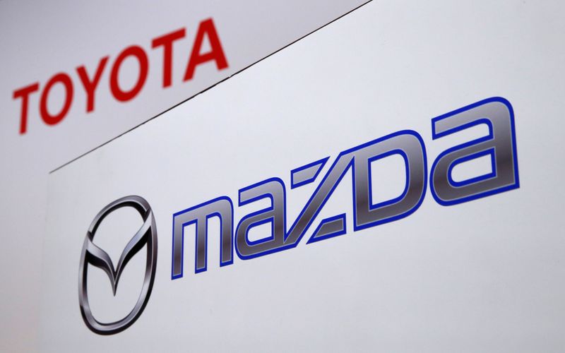 The logos of Toyota Motor and Mazda Motor are pictured