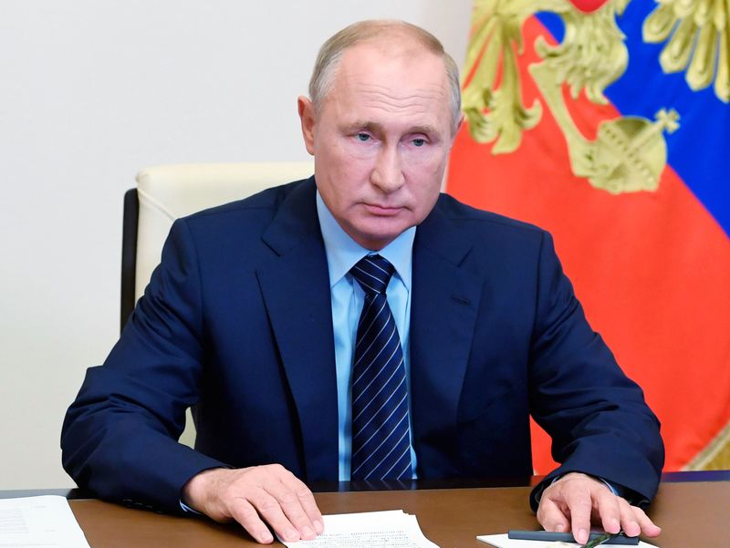 Russia’s President Putin takes part in a a video conference