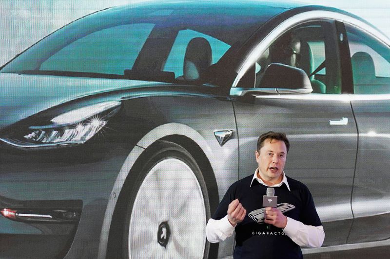 Tesla Inc CEO Elon Musk speaks onstage during a delivery