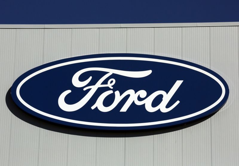 A Ford logo is seen on a wall of the