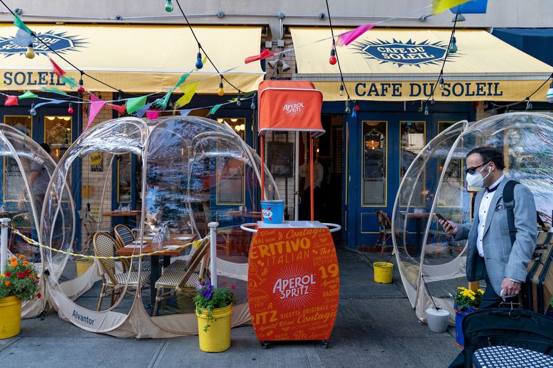 FILE PHOTO: Bubble tents are set up outside Cafe Du