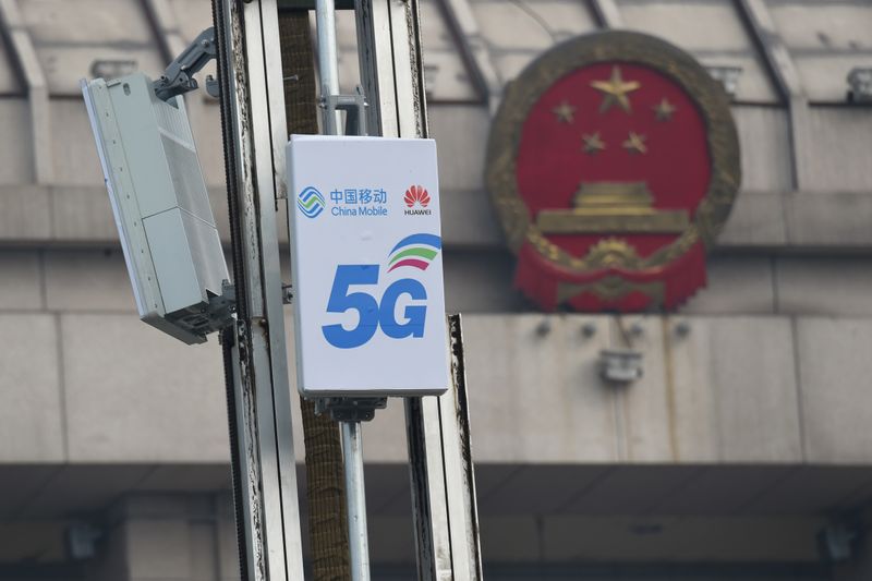 FILE PHOTO: 5G active antenna units with logos of China